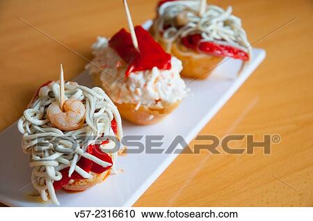 Spanish tapa: prawns, gulas and surimi salad with red pepper. Close view. View Large Photo Image Stock Image - Spanish tapa: prawns, gulas and surimi salad with red pepper. Close view.. Fotosearch