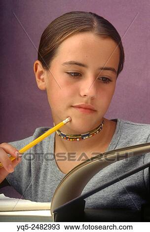 Stock Image - Student studying.. Fotosearch