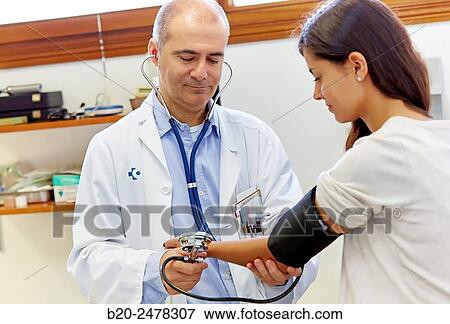 Taking blood pressure, Medical consultation, Ambulatory Lezo, Gipuzkoa, Basque Country, Spain View Large Photo Image Stock Photo - Taking blood pressure, Medical consultation, Ambulatory Lezo, Gipuzkoa, Basque Country, Spain. Fotosearch