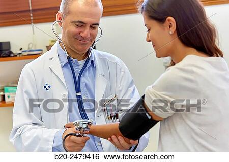 Taking blood pressure, Medical consultation, Ambulatory Lezo, Gipuzkoa, Basque Country, Spain View Large Photo Image Stock Photograph - Taking blood pressure, Medical consultation, Ambulatory Lezo, Gipuzkoa, Basque Country, Spain. Fotosearch