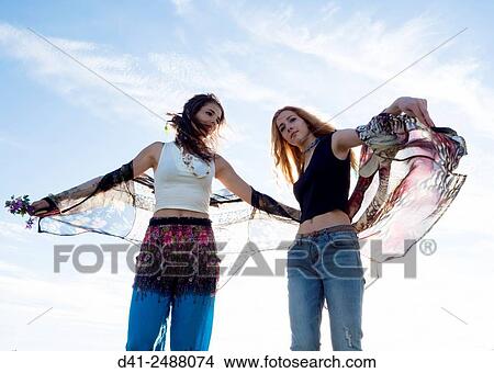 Teenagers friends girls transparent shirt. View Large Photo Image Picture - Teenagers friends girls transparent shirt.. Fotosearch