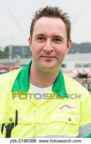 Tilburg, Netherlands. Male employee at Tilburg´s garbage company. View Large Photo Image Stock Photo - Tilburg, Netherlands. Male employee at Tilburg´s garbage company.. Fotosearch