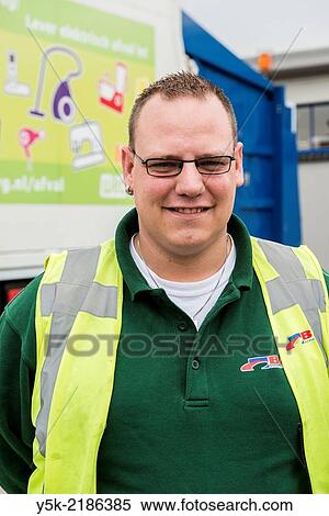 Tilburg, Netherlands. Male employee at Tilburg´s garbage company. View Large Photo Image Stock Photography - Tilburg, Netherlands. Male employee at Tilburg´s garbage company.. Fotosearch