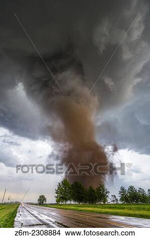 Picture - Tornado from a tornadic supercell approaches from the south, west of York Nebraska June 20, 2011.. Fotosearch