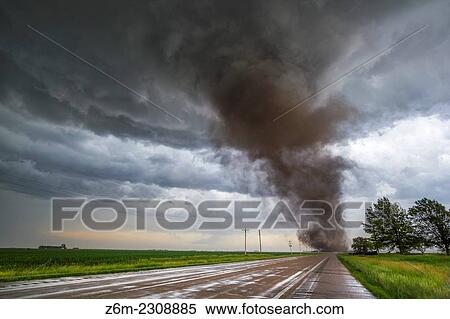 Tornado from a tornadic supercell approaches from the south, west of York Nebraska June 20, 2011. View Large Photo Image Stock Photography - Tornado from a tornadic supercell approaches from the south, west of York Nebraska June 20, 2011.. Fotosearch