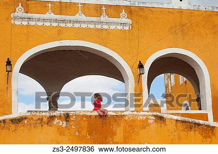 Tourist woman at the Monastery-Convent Of San Antonio De Padua, Izamal, Yucatan, Yucatan Province, Mexico, North America. View Large Photo Image Stock Photograph - Tourist woman at the Monastery-Convent Of San Antonio De Padua, Izamal, Yucatan, Yucatan Province, Mexico, North America.. Fotosearch