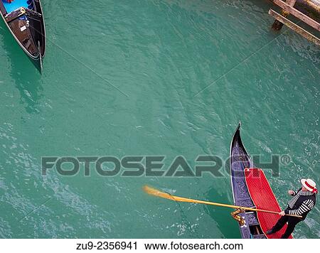 Stock Image - Two gondolas view from above, Venice, Veneto, Italy, Europe.. Fotosearch