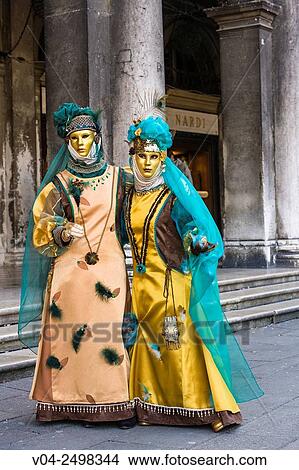 Two masked women at the carnival in Venice, Italy, Europe View Large Photo Image Picture - Two masked women at the carnival in Venice, Italy, Europe. Fotosearch