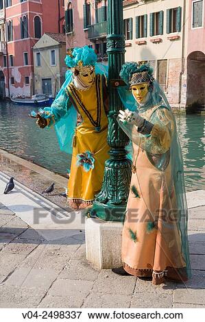 Two masked women at the carnival in Venice, Italy, Europe View Large Photo Image Stock Photo - Two masked women at the carnival in Venice, Italy, Europe. Fotosearch