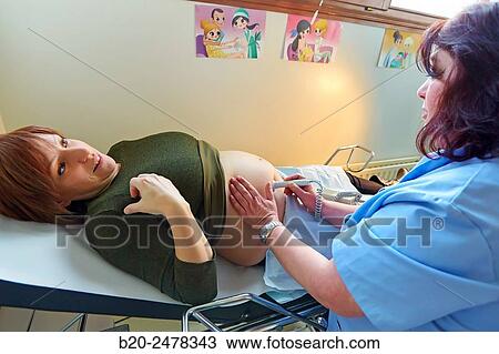 Ultrasound, Midwife examining pregnant, Medical consultation, Ambulatory Lezo, Gipuzkoa, Basque Country, Spain View Large Photo Image Stock Image - Ultrasound, Midwife examining pregnant, Medical consultation, Ambulatory Lezo, Gipuzkoa, Basque Country, Spain. Fotosearch