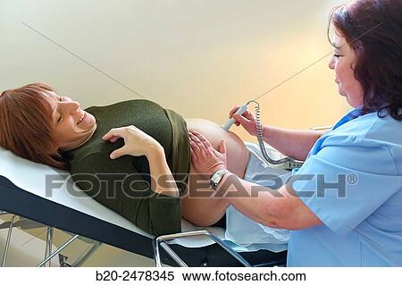 Ultrasound, Midwife examining pregnant, Medical consultation, Ambulatory Lezo, Gipuzkoa, Basque Country, Spain View Large Photo Image Stock Photography - Ultrasound, Midwife examining pregnant, Medical consultation, Ambulatory Lezo, Gipuzkoa, Basque Country, Spain. Fotosearch