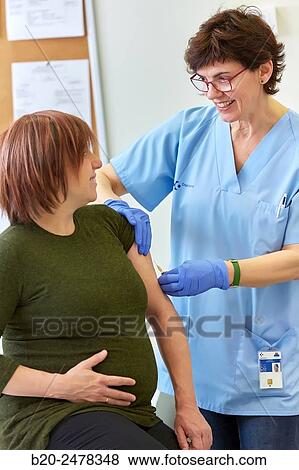 Vaccination, Pregnant, Treatment room, Medical consultation, Ambulatory Lezo, Gipuzkoa, Basque Country, Spain View Large Photo Image Stock Photo - Vaccination, Pregnant, Treatment room, Medical consultation, Ambulatory Lezo, Gipuzkoa, Basque Country, Spain. Fotosearch