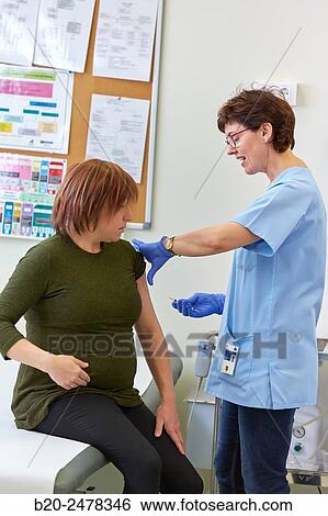 Vaccination, Pregnant, Treatment room, Medical consultation, Ambulatory Lezo, Gipuzkoa, Basque Country, Spain View Large Photo Image Stock Photograph - Vaccination, Pregnant, Treatment room, Medical consultation, Ambulatory Lezo, Gipuzkoa, Basque Country, Spain. Fotosearch