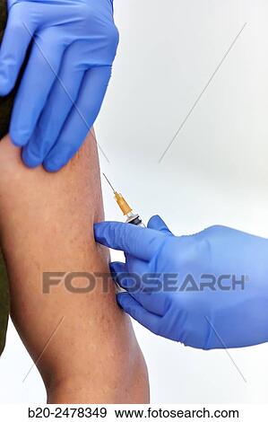 Stock Photo - Vaccination, Treatment room, Medical consultation, Ambulatory Lezo, Gipuzkoa, Basque Country, Spain. Fotosearch