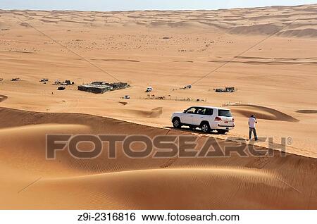 Stock Photograph - Valley in the Wahiba Sands, Oman.. Fotosearch