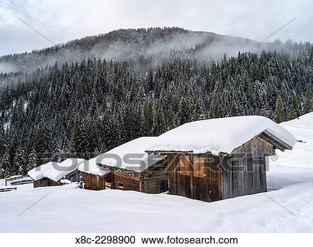 Valley Lesachtal during Winter, mountain huts called Alpe in deep snow. Europe, Central Europe, Austria, January. View Large Photo Image Stock Image - Valley Lesachtal during Winter, mountain huts called Alpe in deep snow. Europe, Central Europe, Austria, January.. Fotosearch