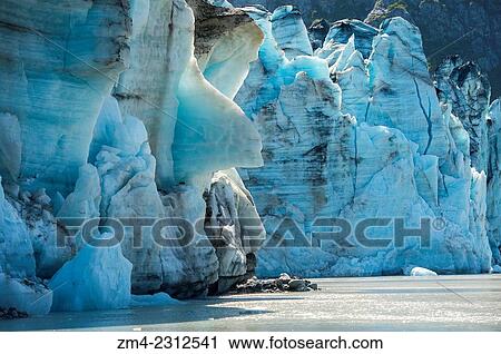 View of crevasses at the glacier face of Lamplugh Glacier in Johns Hopkins Inlet in Glacier Bay National Park, Southeast Alaska, USA. View Large Photo Image Stock Image - View of crevasses at the glacier face of Lamplugh Glacier in Johns Hopkins Inlet in Glacier Bay National Park, Southeast Alaska, USA.. Fotosearch