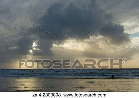 View of Pacific Ocean with clouds from Cannon Beach on the Northern Oregon Coast, USA. View Large Photo Image Stock Photo - View of Pacific Ocean with clouds from Cannon Beach on the Northern Oregon Coast, USA.. Fotosearch
