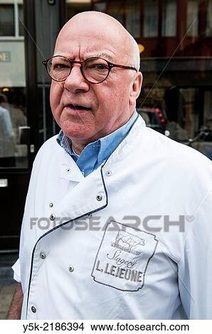 Willem II Straat, Tilburg, Netherlands. Mr LeJeune is third 3rd generation butcher at his butchery, established in 1902, by the his grandfather. View Large Photo Image Picture - Willem II Straat, Tilburg, Netherlands. Mr LeJeune is third 3rd generation butcher at his butchery, established in 1902, by the his grandfather.. Fotosearch