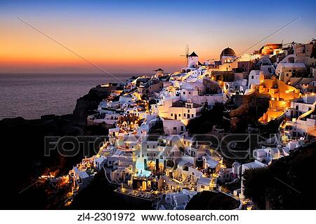 Windmills and village of Oia at sunset. Greece, Greek islands in the Aegean sea, the Cyclades, Santorini island (Thera, Thira). View Large Photo Image Stock Image - Windmills and village of Oia at sunset. Greece, Greek islands in the Aegean sea, the Cyclades, Santorini island (Thera, Thira).. Fotosearch