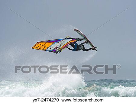 Stock Image - Windsurfing. Tarifa, Cadiz, Costa de la Luz, Andalusia, Spain.. Fotosearch