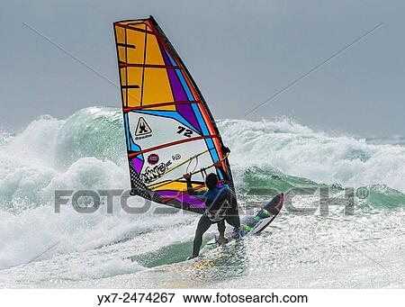 Windsurfing. Tarifa, Cadiz, Costa de la Luz, Andalusia, Spain. View Large Photo Image Stock Photo - Windsurfing. Tarifa, Cadiz, Costa de la Luz, Andalusia, Spain.. Fotosearch