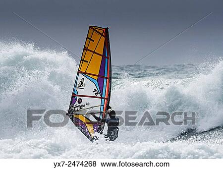 Stock Photo - Windsurfing. Tarifa, Cadiz, Costa de la Luz, Andalusia, Spain.. Fotosearch