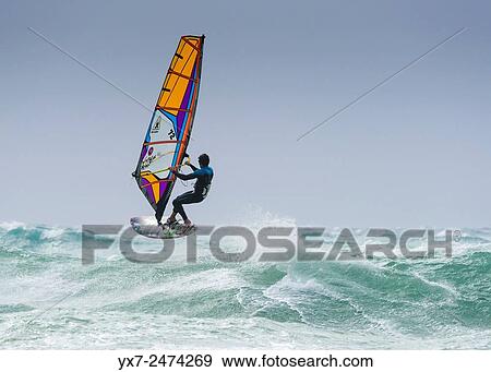 Stock Photo - Windsurfing. Tarifa, Cadiz, Costa de la Luz, Andalusia, Spain.. Fotosearch