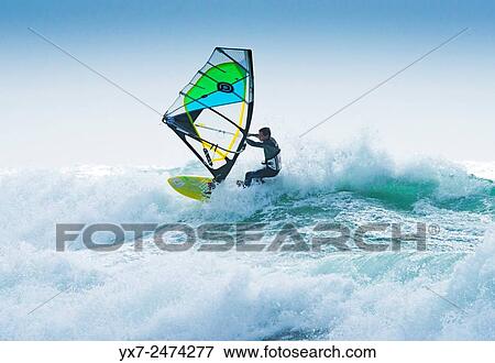 Stock Photo - Windsurfing. Tarifa, Cadiz, Costa de la Luz, Andalusia, Spain.. Fotosearch