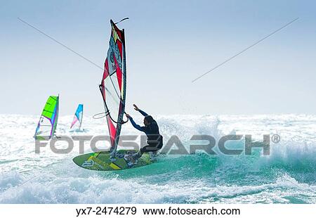 Stock Photo - Windsurfing. Tarifa, Cadiz, Costa de la Luz, Andalusia, Spain.. Fotosearch