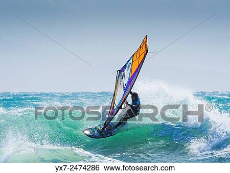 Windsurfing. Tarifa, Cadiz, Costa de la Luz, Andalusia, Spain. View Large Photo Image Stock Photograph - Windsurfing. Tarifa, Cadiz, Costa de la Luz, Andalusia, Spain.. Fotosearch