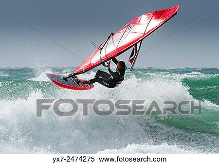 Windsurfing. Tarifa, Cadiz, Costa de la Luz, Andalusia, Spain. View Large Photo Image Stock Photography - Windsurfing. Tarifa, Cadiz, Costa de la Luz, Andalusia, Spain.. Fotosearch