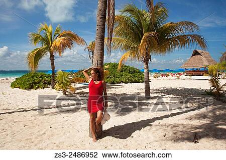 Woman at the beach, Cancun, Quintana Roo, Yucatan Province, Mexico, North America. View Large Photo Image Stock Image - Woman at the beach, Cancun, Quintana Roo, Yucatan Province, Mexico, North America.. Fotosearch
