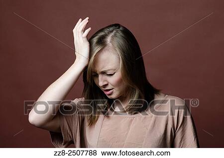 Woman hand on head with aheadache. View Large Photo Image Stock Photo - Woman hand on head with aheadache.. Fotosearch