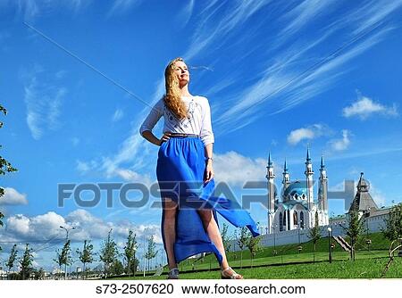 Stock Image - Woman poses in Kul Sharif mosque in Kazan Kremlin, Russia. Fotosearch