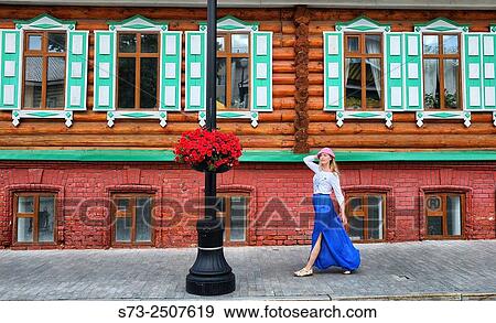 Woman walking in a Kazan street, Tatarstan, Russia View Large Photo Image Stock Photo - Woman walking in a Kazan street, Tatarstan, Russia. Fotosearch