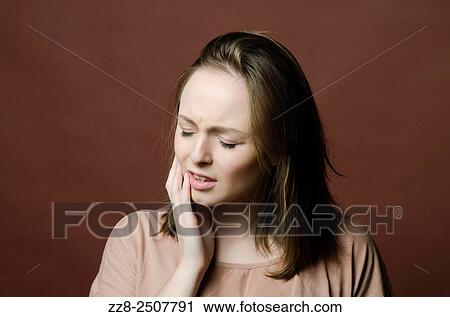 woman with a toothache. View Large Photo Image Stock Image - woman with a toothache.. Fotosearch