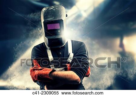 Stock Photography - Worker in a foundry.. Fotosearch