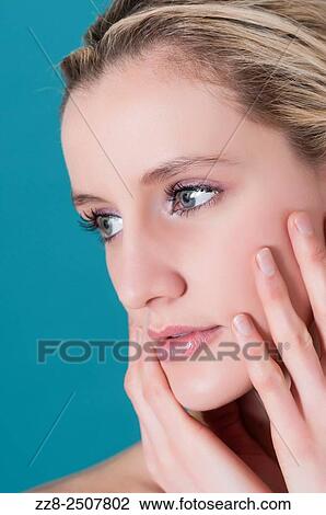 Worried young woman looking away. View Large Photo Image Stock Image - Worried young woman looking away.. Fotosearch