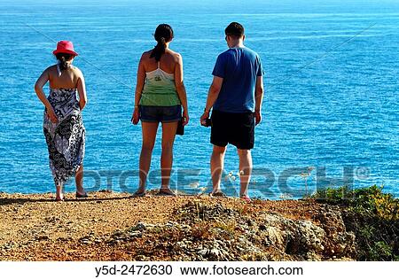 young family admiring view for Atlantic Ocean Ponta da Piedade, Lagos, Algarve, Portugal View Large Photo Image Stock Image - young family admiring view for Atlantic Ocean Ponta da Piedade, Lagos, Algarve, Portugal. Fotosearch