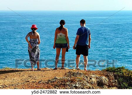 young family admiring view for Atlantic Ocean Ponta da Piedade, Lagos, Algarve, Portugal View Large Photo Image Stock Image - young family admiring view for Atlantic Ocean Ponta da Piedade, Lagos, Algarve, Portugal. Fotosearch
