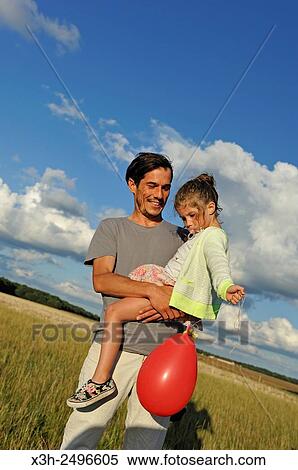 young father and his daughter, Ile-de-France, France, Europe. View Large Photo Image Stock Photography - young father and his daughter, Ile-de-France, France, Europe.. Fotosearch