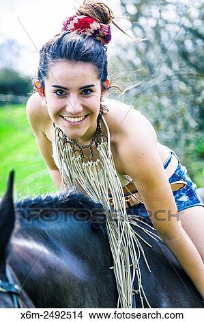 Picture - Young girl and horse. Ayegui, Navarre, Spain.. Fotosearch