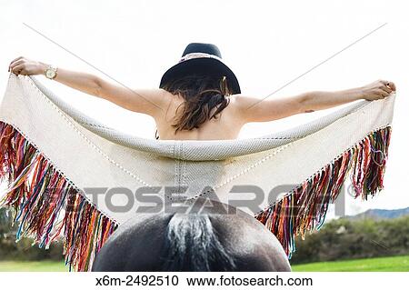 Stock Image - Young girl and horse. Ayegui, Navarre, Spain.. Fotosearch