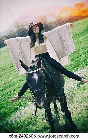 Stock Photography - Young girl and horse. Ayegui, Navarre, Spain.. Fotosearch