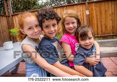 10 year old girl, 7 year old boy, 6 year old girl and 3 year old boy, all cousins, hugging, MR# 6063 and 6302. View Large Photo Image Stock Image - 10 year old girl, 7 year old boy, 6 year old girl and 3 year old boy, all cousins, hugging, MR# 6063 and 6302.. Fotosearch