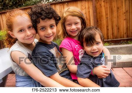 10 year old girl, 7 year old boy, 6 year old girl and 3 year old boy, all cousins, hugging, MR# 6063 and 6302. View Large Photo Image Stock Image - 10 year old girl, 7 year old boy, 6 year old girl and 3 year old boy, all cousins, hugging, MR# 6063 and 6302.. Fotosearch
