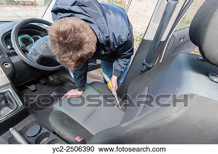 A 15 year old teenage boy cleaning the interior of a car to earn money. View Large Photo Image Stock Image - A 15 year old teenage boy cleaning the interior of a car to earn money.. Fotosearch