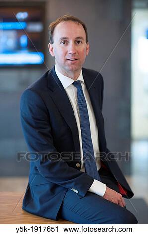Almere, Netherlands. 23rd floor of an office-building. Portrait of a man in suit, working as a marketing manager for a cooperation. View Large Photo Image Stock Image - Almere, Netherlands. 23rd floor of an office-building. Portrait of a man in suit, working as a marketing manager for a cooperation.. Fotosearch