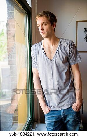 Amsterdam, Netherlands. Young man in his twenties, diagnosed with ADD or Attention Deficit Disorder. He works several jobs and considers to make a documentary with his journalist girlfriend. View Large Photo Image Stock Image - Amsterdam, Netherlands. Young man in his twenties, diagnosed with ADD or Attention Deficit Disorder. He works several jobs and considers to make a documentary with his journalist girlfriend.. Fotosearch